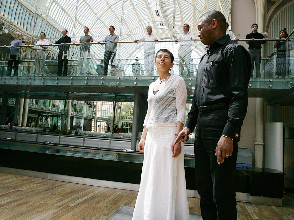 Michel Harper and Helen in the dress rehearsal of Helen Chadwick's THE SINGING CIRCLE in the Floral Hall at The Royal Opera House